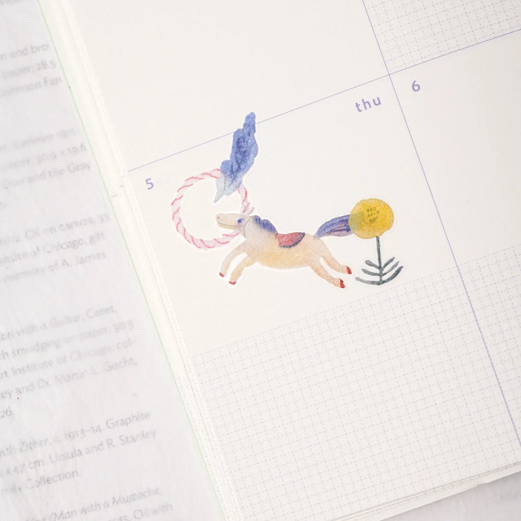 Miles Away .doremi. PET Tape by Dodolulu — unicorn-and-flower PET tape in a planner spread, for journaling