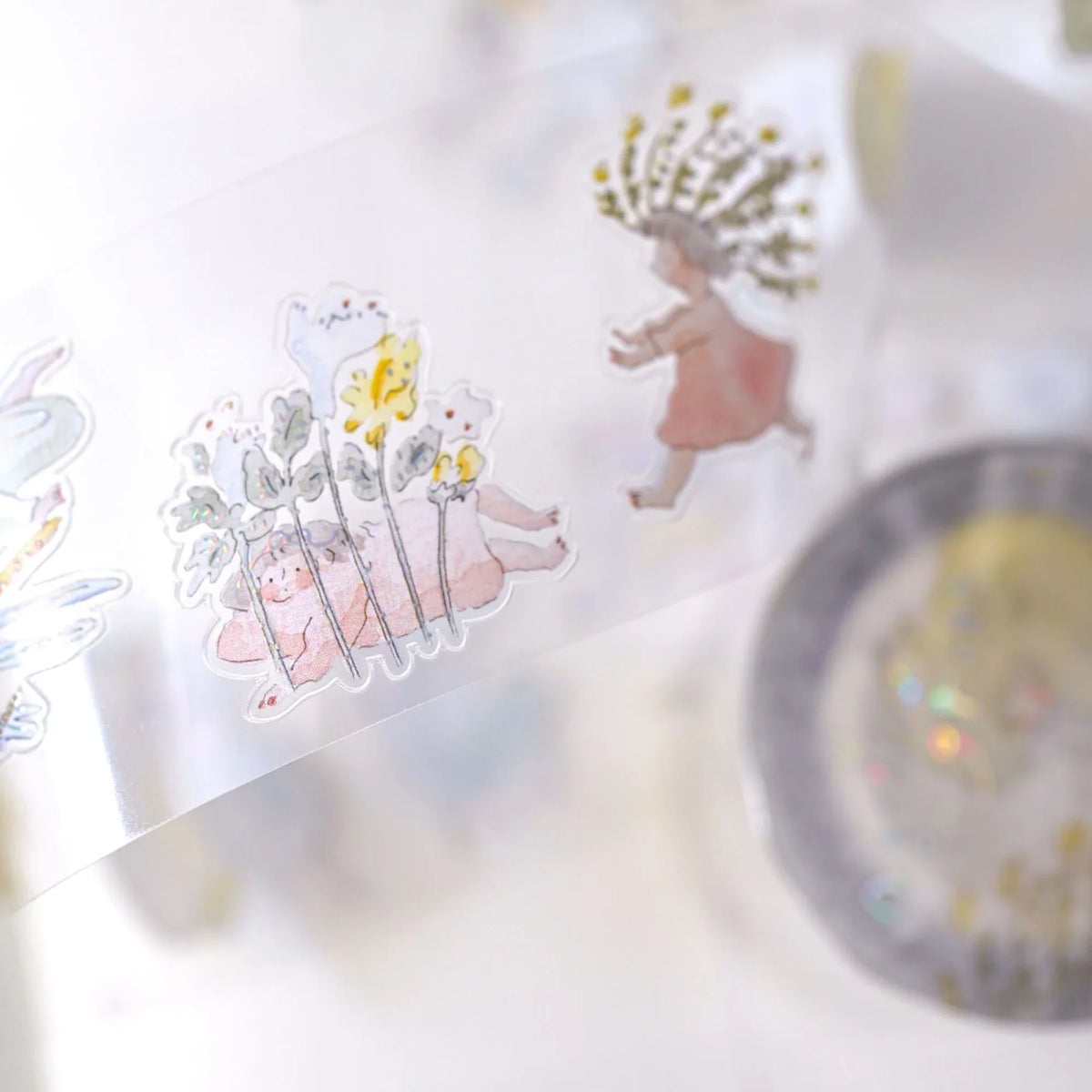 Nestled In Green .doremi. PET Tape by Dodolulu — pastel character-and-floral PET tape close-up, for journaling