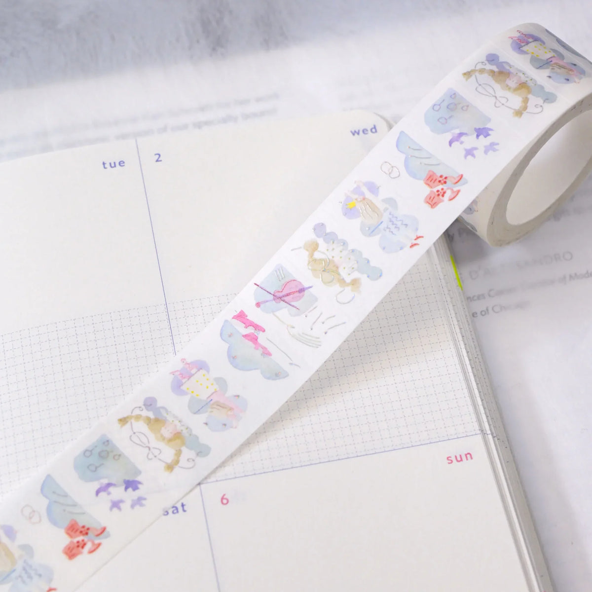 Reverie Foil Washi Label Tape by Dodolulu — pastel washi label tape across a planner, for journaling