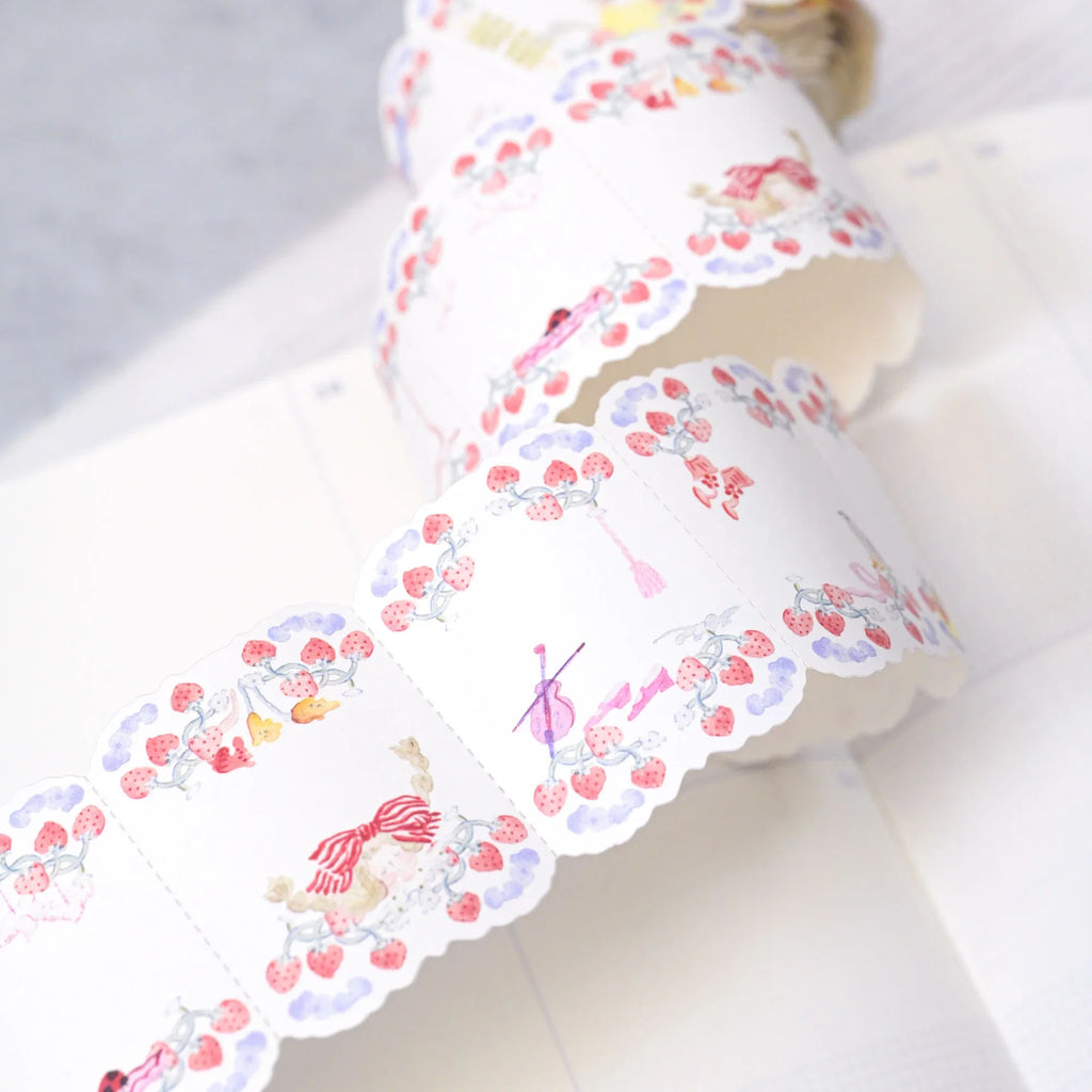 Berry Tales Memo Label Tape by Dodolulu — strawberry-and-cherub washi label tape unrolled, for journaling