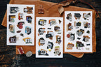 Three sheets of decorative stickers with numbers and various designs on a wooden surface.