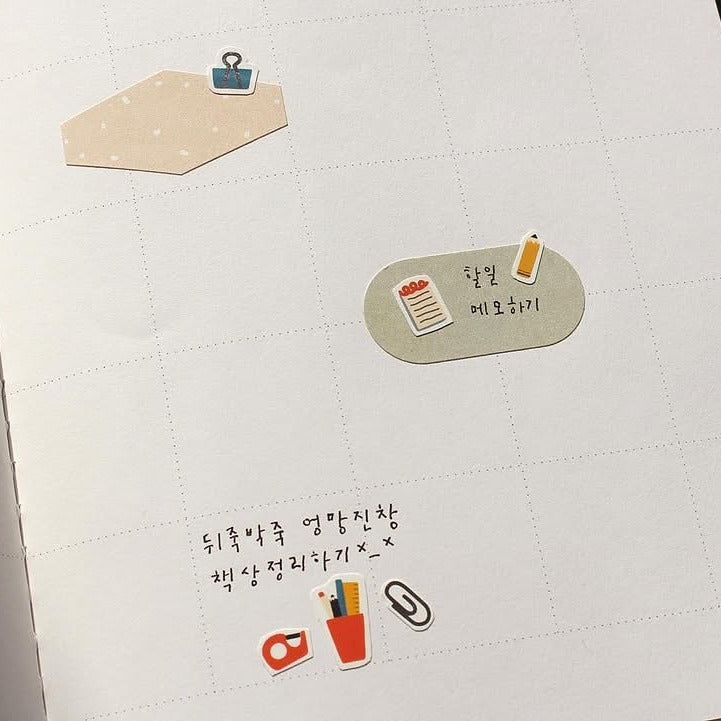 Decorative stationery items on a textured white surface, from the Deco 07 Sticker Sheet