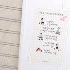 Notebook with a fitness routine illustration on a textured surface