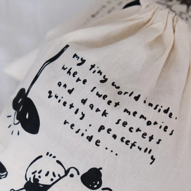 Second view of the Black One Stamp at a Time canvas pouch design on a white background