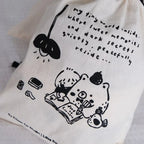 White tote bag with black illustrations and text on a light gray background