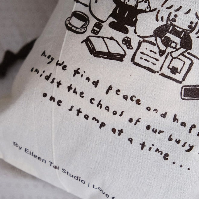 Additional design detail of the Brown One Stamp at a Time pouch illustrations on white
