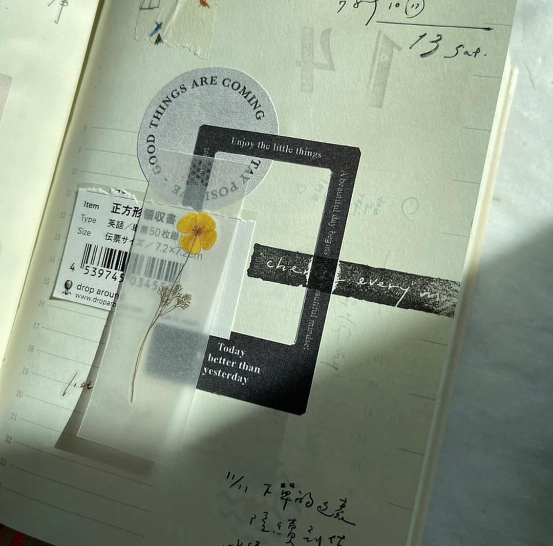 Notebook decorated with Embossing Transfer Stickers and a yellow flower on texture