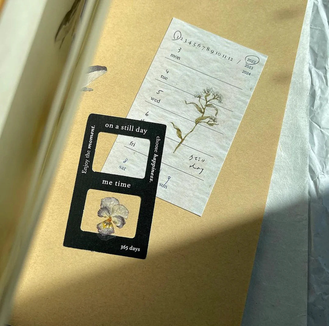 Embossing Transfer Sticker packaging with a card and deco elements on a textured surface