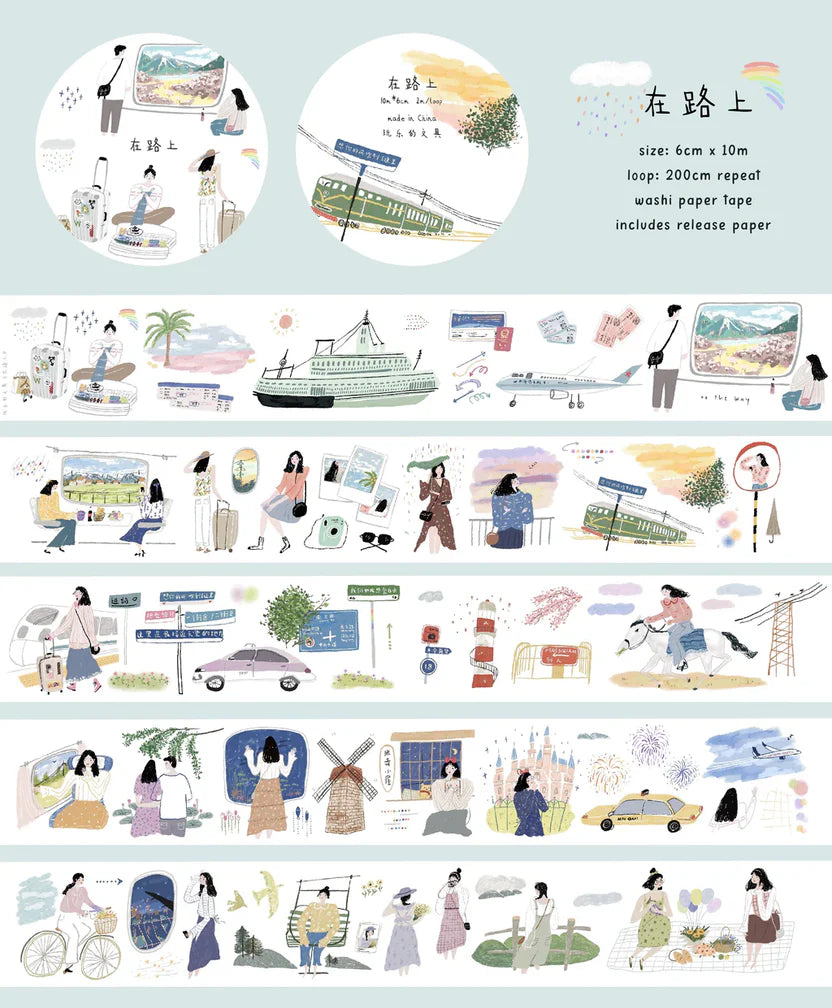 Set of En Route Washi Tape rolls with travel scenes and text on a light blue backdrop