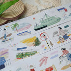 Sheet of illustrated stickers with travel-themed designs on a textured surface.