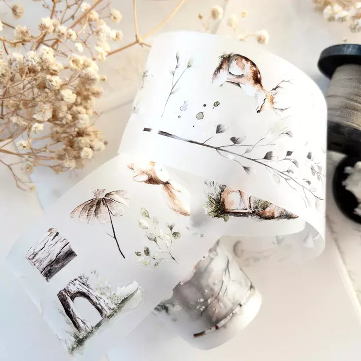 Enchanted Forest PET Tape woodland floral patterns styled on pillows on a light background