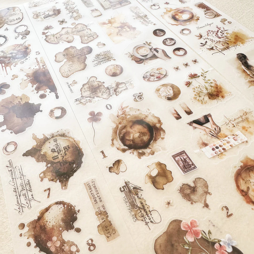 Collection of vintage-style stickers with artistic designs on a beige background