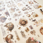 Collection of vintage-style stickers with artistic designs on a beige background
