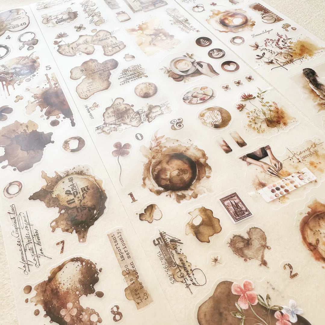 Collection of Espresso Enthusiast PET Tape vintage sticker pieces on a beige background