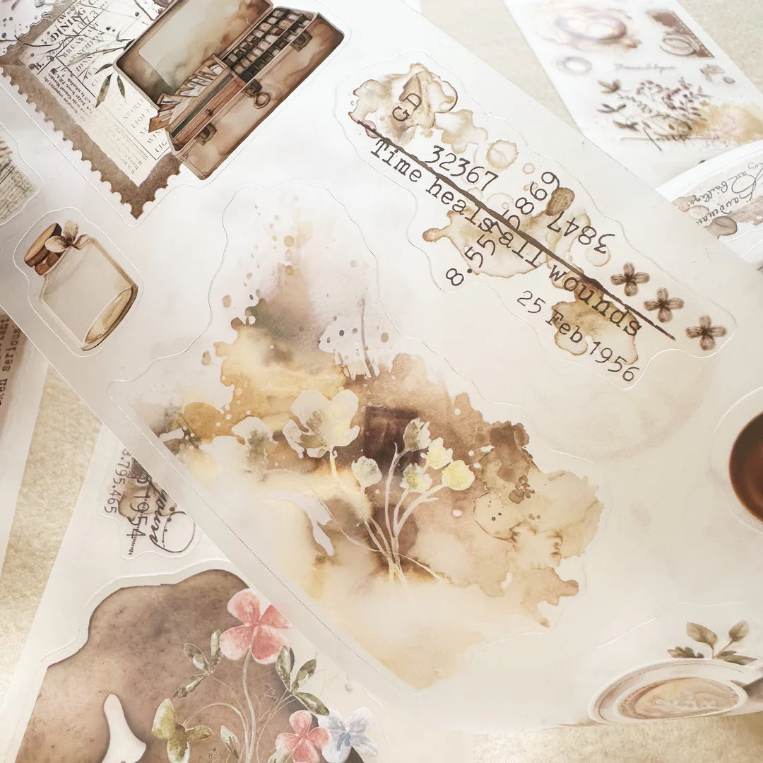 Espresso Enthusiast PET Tape floral and travel-themed stickers on a textured surface