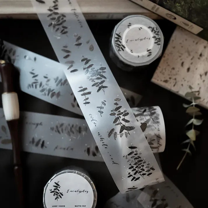 Eucalyptus Matte PET Tape with a botanical leaf design applied on a dark surface, close-up detail shot