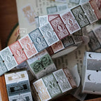 Collection of vintage-style rubber stamps with intricate designs on a wooden block.