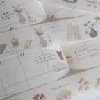 Calendar sheets with floral and nature-themed designs on a white background