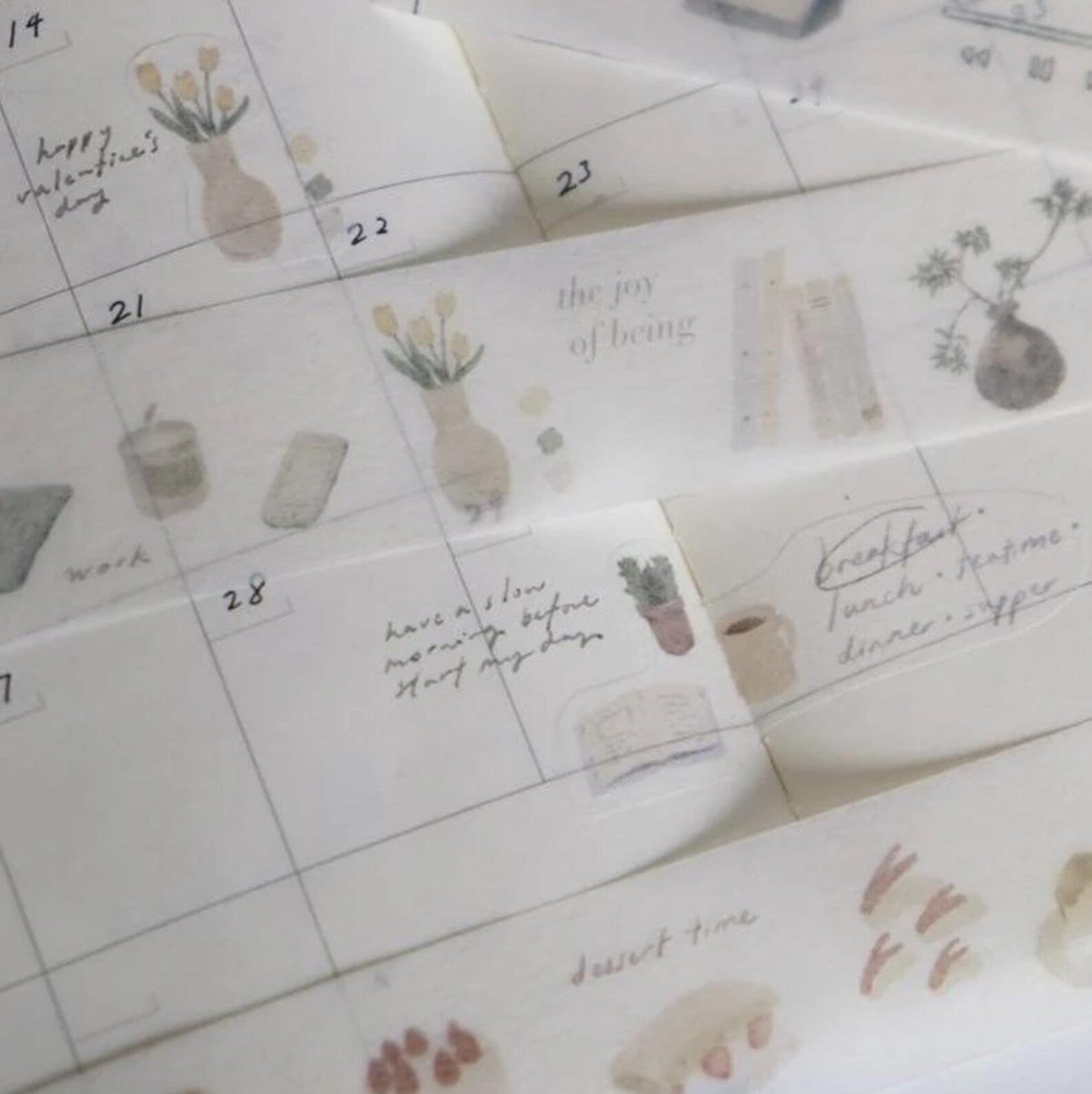 Calendar sheets with floral and nature-themed designs on a white background