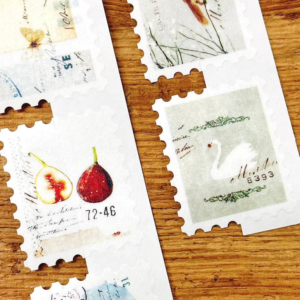 Collection of FR-001 Washi Tape stamp-style designs laid out on a warm wooden surface