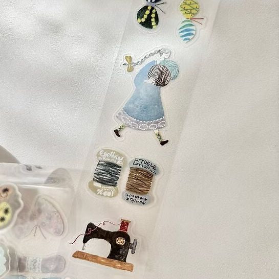 Fabric PET Tape sewing-themed charm designs styled as a keychain on a white background