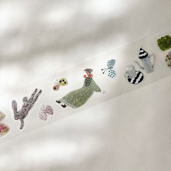 Collection of Fabric PET Tape decorative sticker pieces laid on a white background