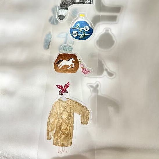 Fabric PET Tape clear packaging with a dress figure and horse print on light grey