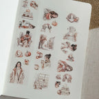 Sticker sheet with illustrated characters and scenes on a notebook page.