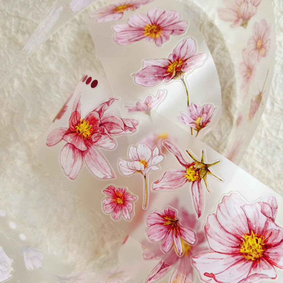 Fei Sangluo Flower A45 PET Tape blooms styled across a textured fabric background