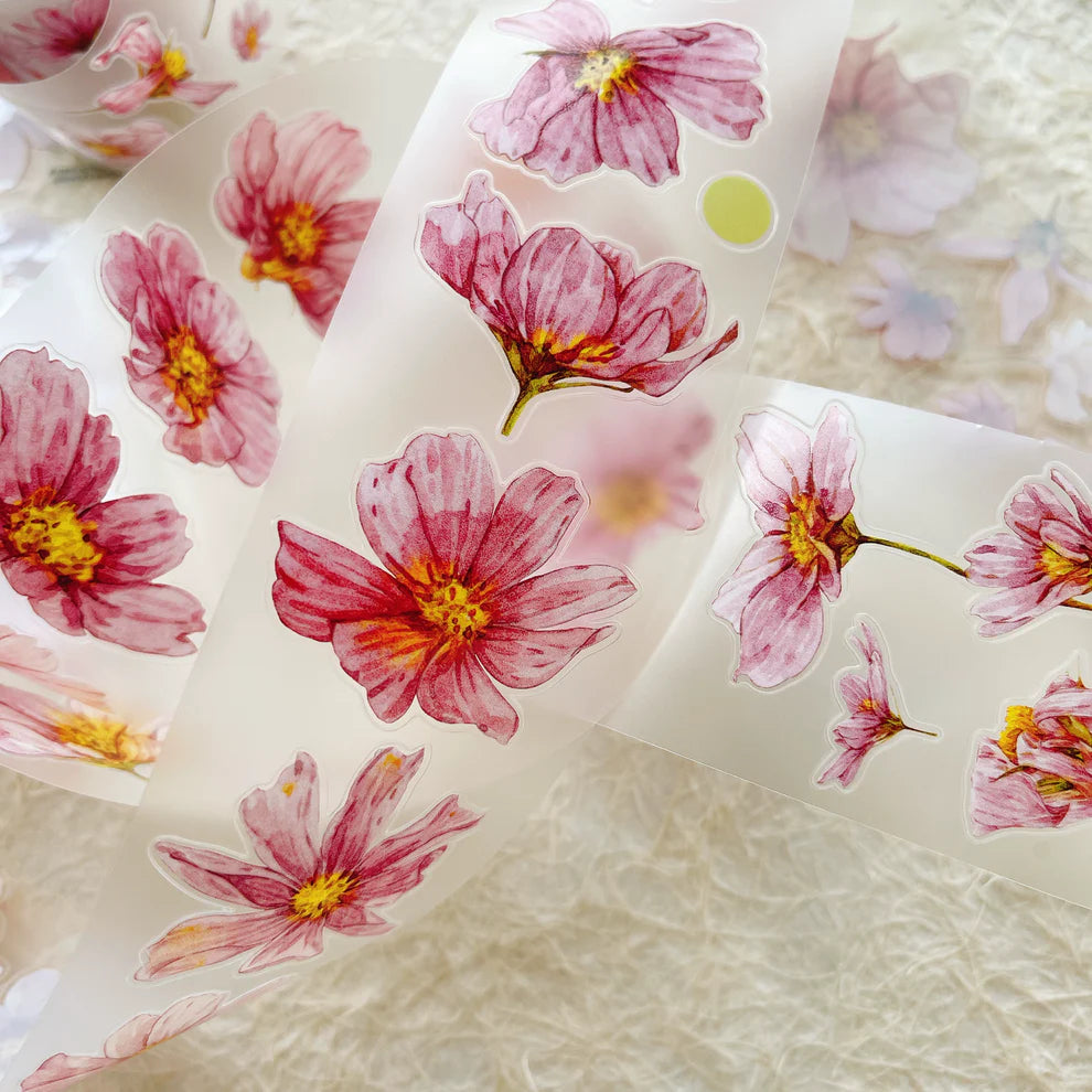Close-up of Fei Sangluo Flower A45 PET Tape pink flower stickers on textured white