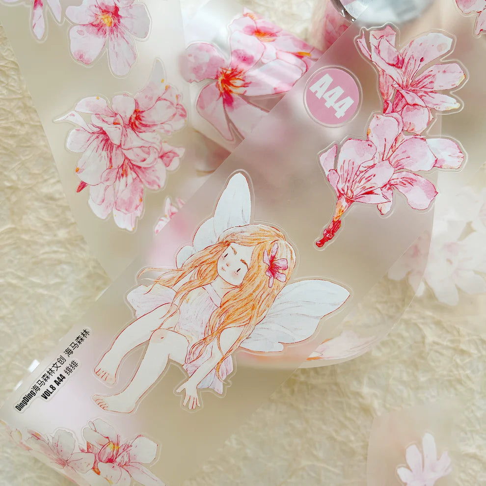 Cosmetic product with fairy design and cherry blossoms on a light background