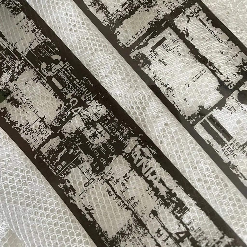 Close-up of a textured surface with printed text and patterns
