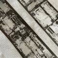 Close-up of a textured surface with printed text and patterns