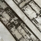 Close-up of a textured surface with printed text and patterns