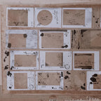 Collection of old documents and letters on a wooden surface