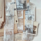 Collage of vintage-style photographs and text on a textured surface
