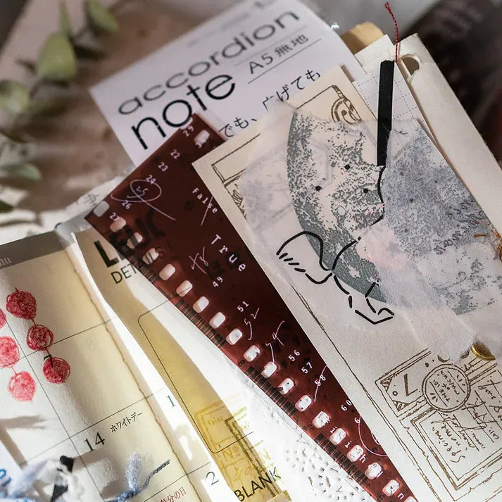 Film PET Tape in a journaling flat lay with a notebook, ruler and deco stationery elements around it