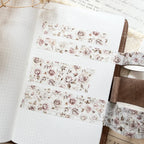 Floral tape with a wooden spool on a textured surface