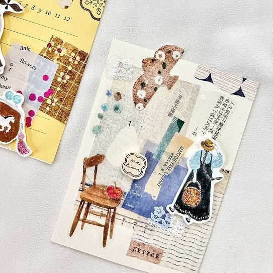 Fly Washi Tape bear, chair and deco element designs on a textured surface, flat lay