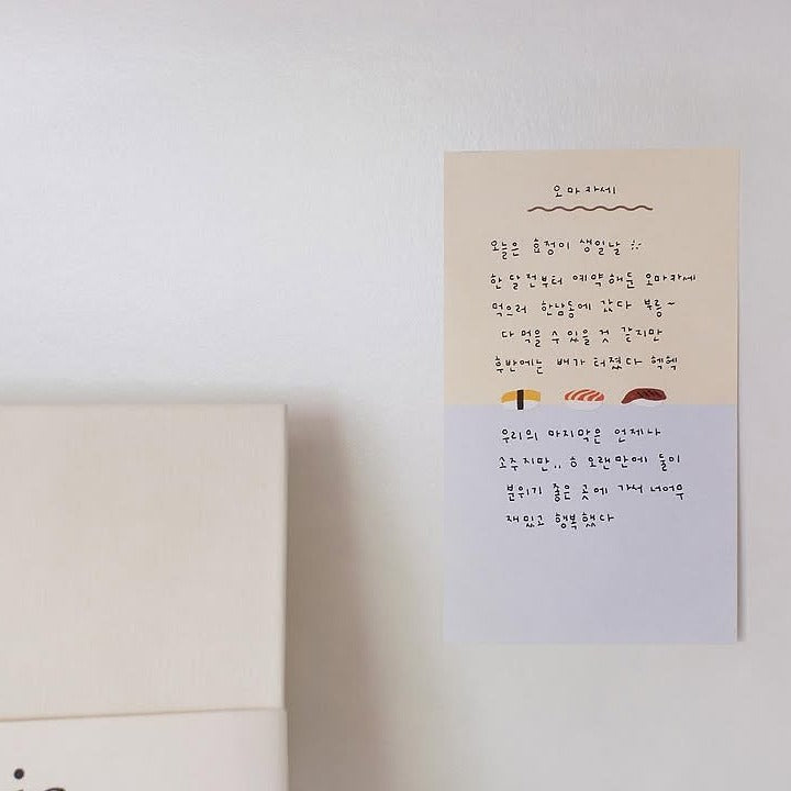 Poster with text and illustrations on a wall beside a bed, from the Food Trip 6 Sticker Sheet