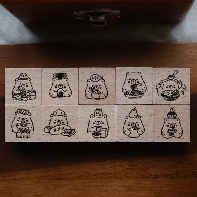 Full set of Foodie Bears rubber stamps with food-themed bear designs on a wooden surface