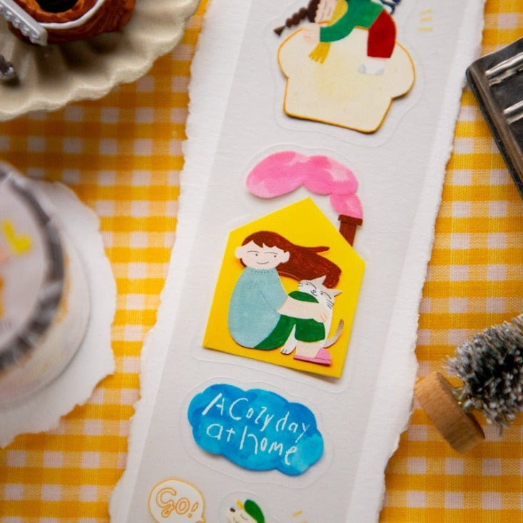 Decorative pillow with cartoon characters on a yellow checkered tablecloth