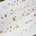 Sheet of decorative stickers with various designs on a white background