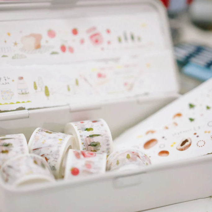 Forest Bakery PET Tape styled on a small white floral container holding tiny cups, close-up