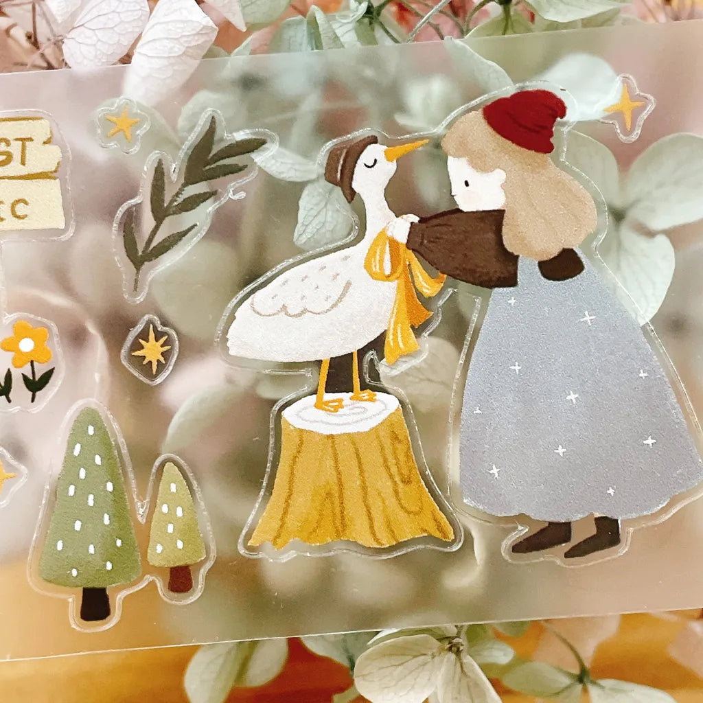 Forest Concert PET Tape by Yier — woman holding a white bird PET tape close-up, for journaling