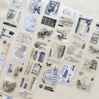 Collection of black and white stamps on a beige background