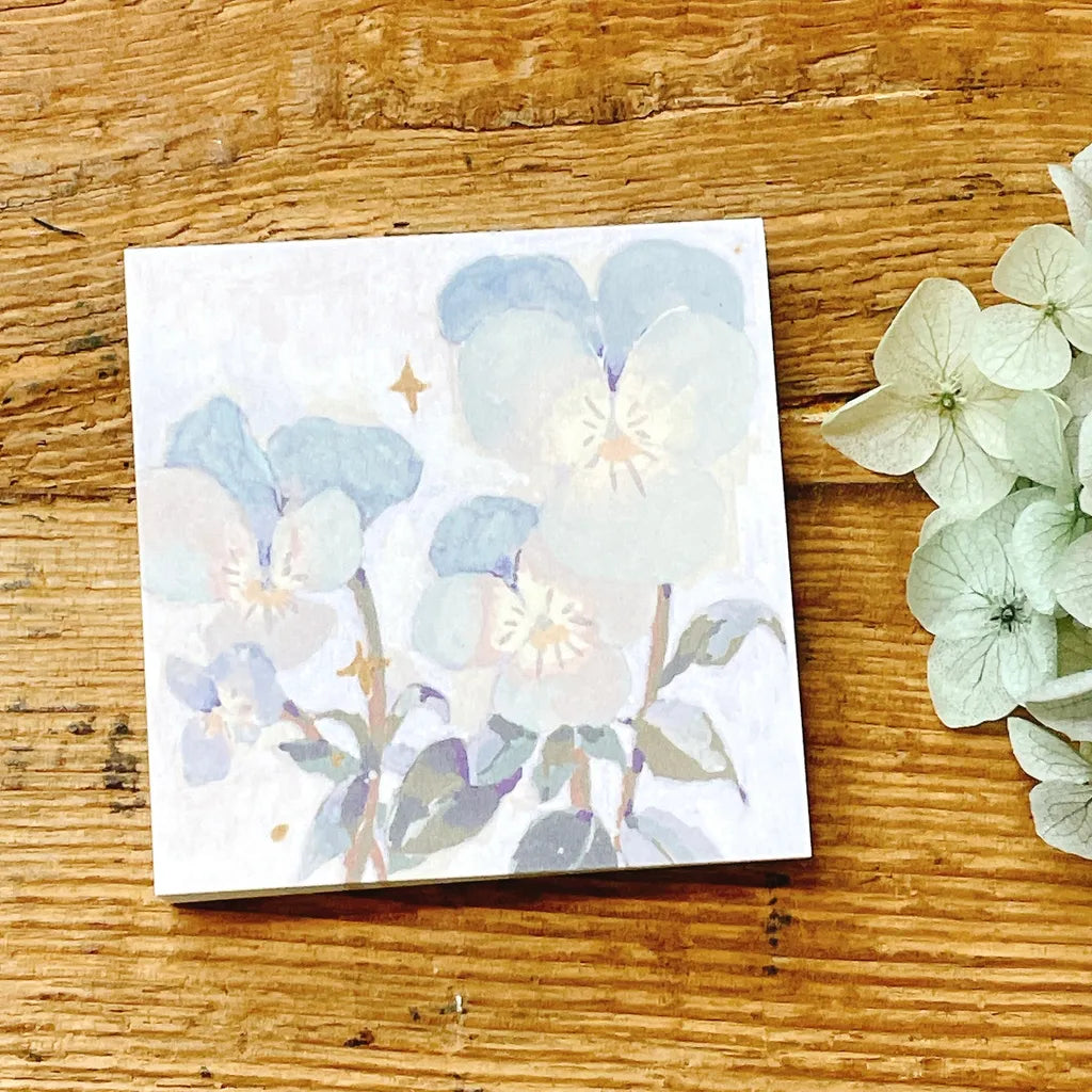 Blue Violet Memo Pad from the Freckled Camellia series styled on wood with fresh hydrangeas