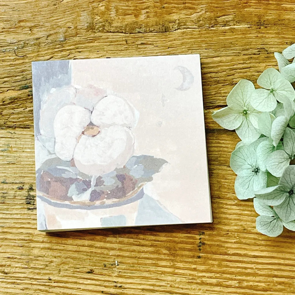 Pink Violet Memo Pad by Freckles Tea with floral cover styled on wood beside hydrangeas