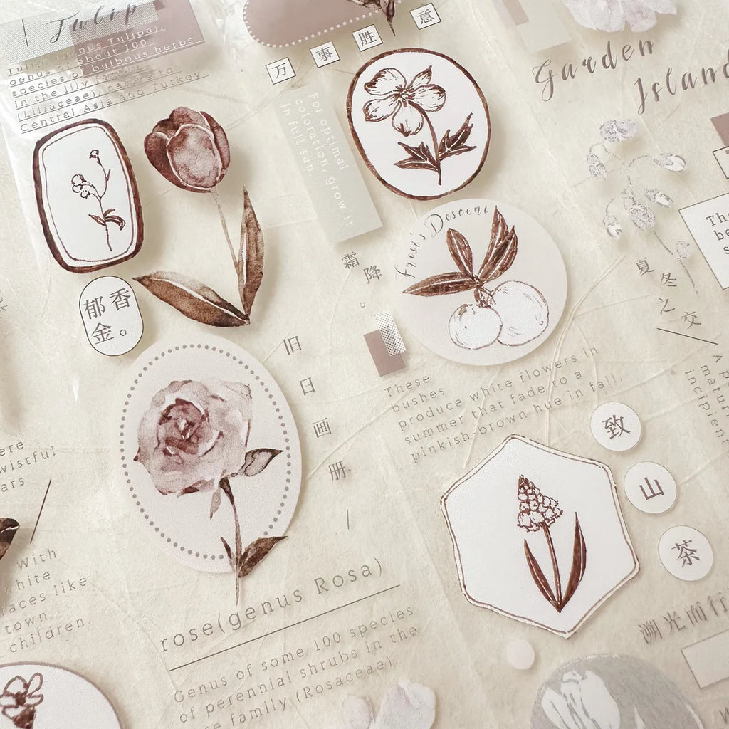 Decorative stickers with floral designs on a textured surface with text and graphics.