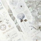 Set of decorative stickers with floral designs on a white background